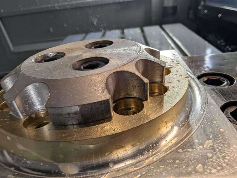 Aluminium bronze CNC machined and deburred whilst fixtures in the jig