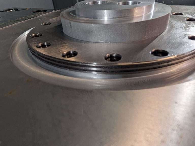 Graphite laminated triple offset valve seals during machining